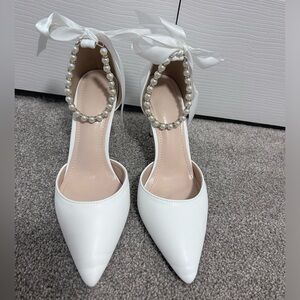 White heels with pearl strap